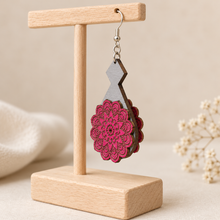 Cargar imagen en el visor de la galería, Side view of a Mystic Mandala Bloom wooden earring showing the 2 mm American linden base with matching hand-painted mandala pieces layered on both sides and a single silver-tone hook attached to the base.