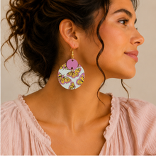 Cargar imagen en el visor de la galería, Model wearing Boho Chic Butterfly wooden earrings with a soft blush blouse and hair pulled back.
