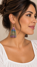 Cargar imagen en el visor de la galería, Model wearing Pearlescent Rainbow lightweight multicolor wooden earrings with a simple white top
